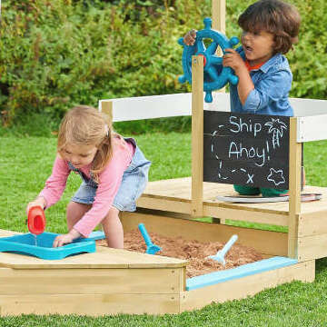 kinder im sandkasten 360x360